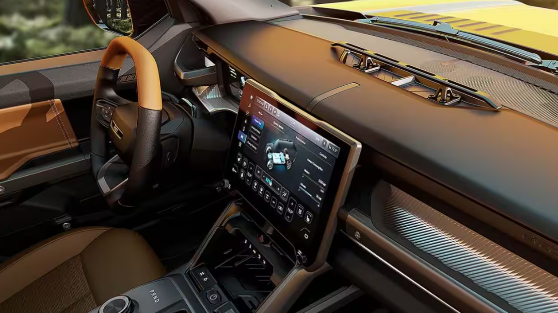 2026 Jeep Recon interior with large touchscreen and rugged dash at 495 Chrysler Jeep Dodge RAM