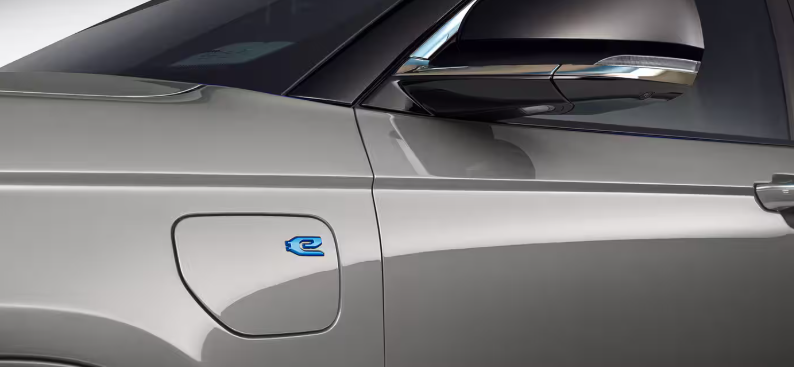 2026 Jeep Grand Cherokee 4xe charging port badge close-up